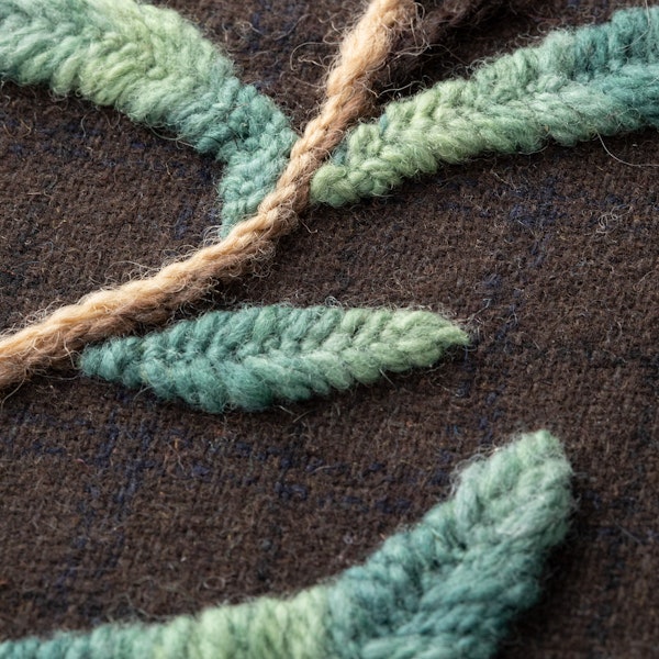 When stitching design elements that lean right or left, ply twist can interact with the stitch angle, changing the visual effect.