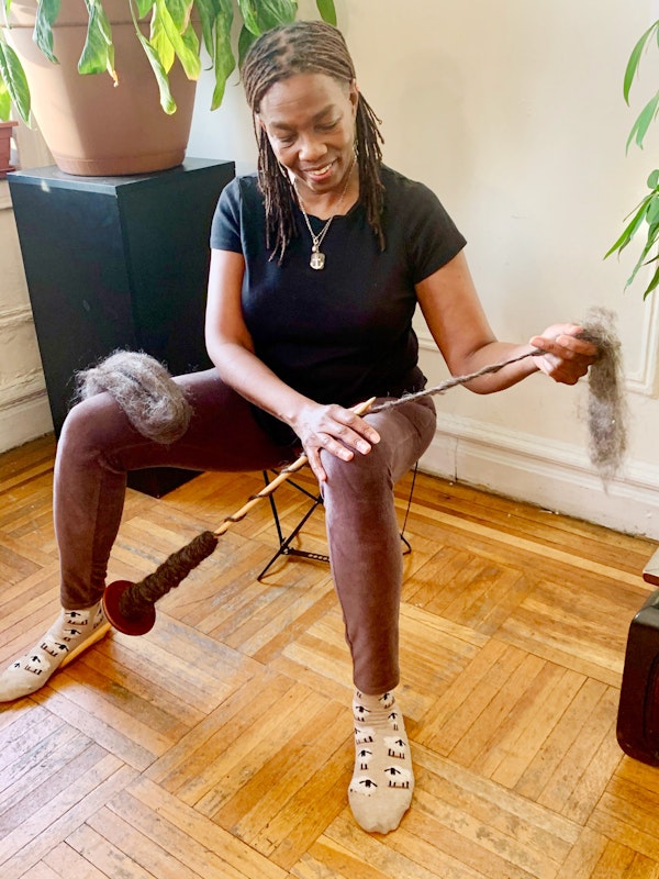 Sahara spins much of her bulky yarn on her Navajo spindle for better control. Photo by Ian Keldoulis