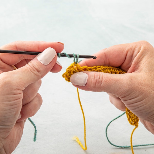 Step 4. Pull loop through work and up to the required height to match the height of the row or round.