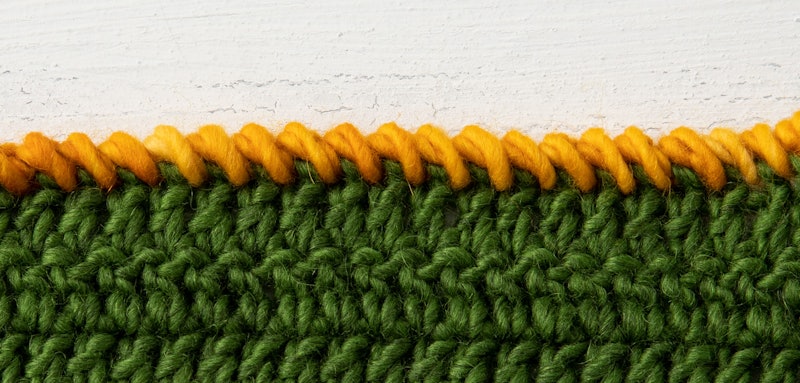 Crab stitch edge worked in left-handed crochet