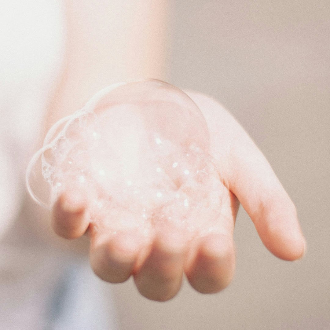 Soap bubbles on hand