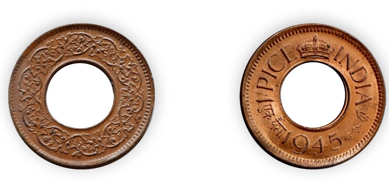 Indian holed anna coins