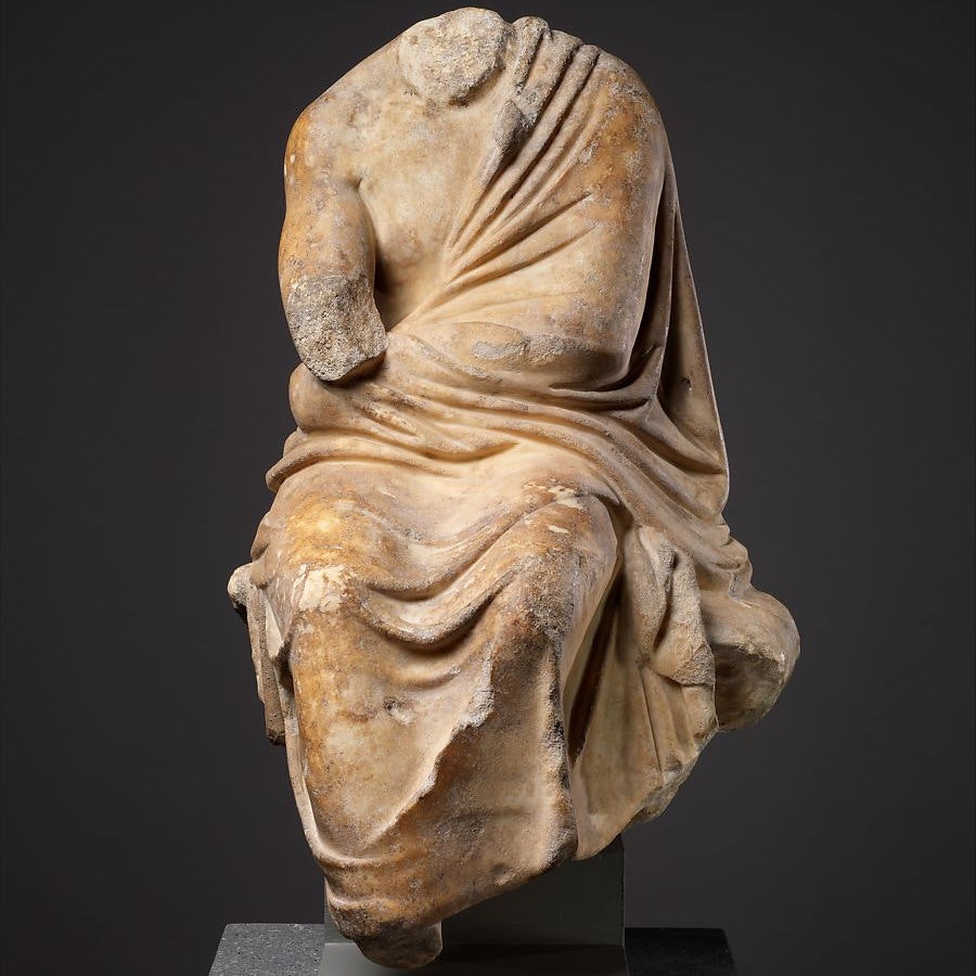 Marble statuette of a philosopher wearing a toga