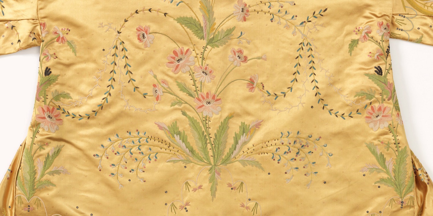 This is a Child's blouse. It is dated 18th–19th century and we acquired it in 1902. Its medium is silk, metallic yarns and its technique is tambour embroidery on satin weave. It is a part of the Textiles department.