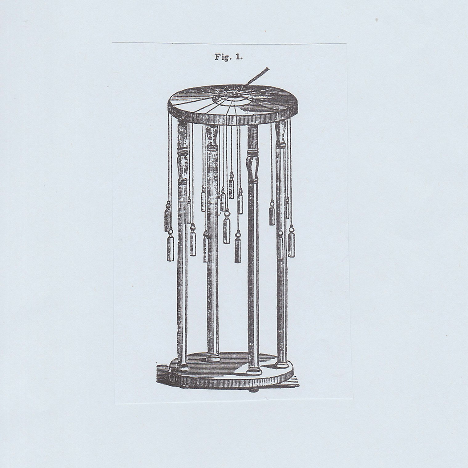 Illustration of a Common Type of Hair Braiding Table, including Bobbins and Weights, *Godey’s Lady’s Book,* 41, 377. 1850.