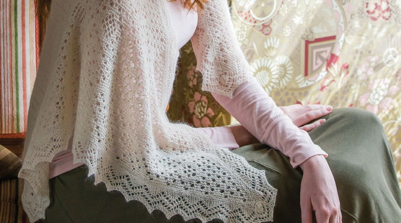A lace shawl on a woman's shoulders