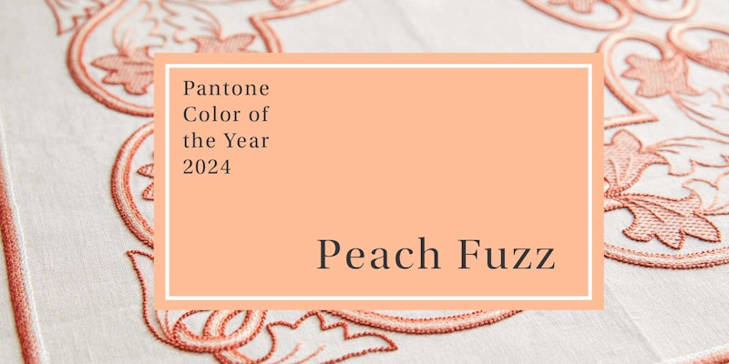Pantone’s Color of the year for 2024, Peach Fuzz with a peach and white stitched tablecloth