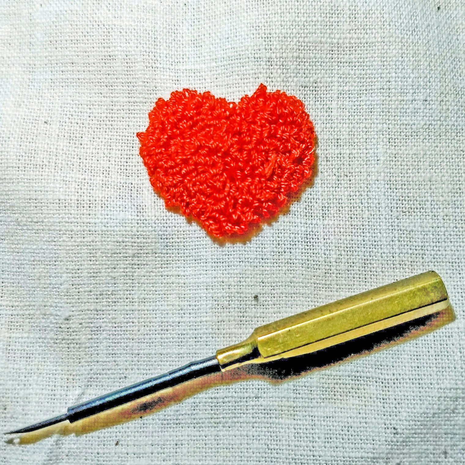 Finished miniature punch needle heart