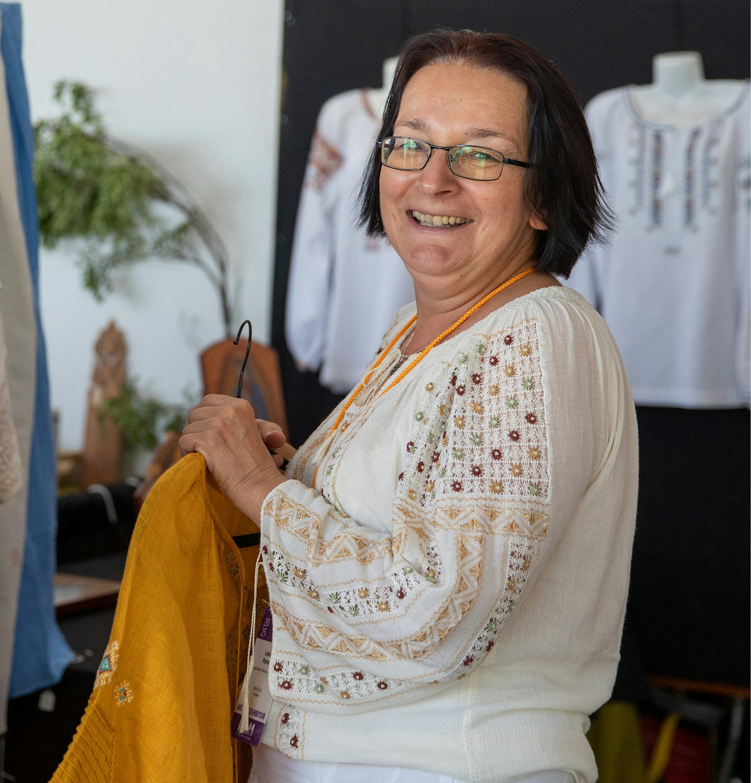 Ukrainian Embroidery artist Lesia Pona enjoys herself in Santa Fe. Photo by Kathi Littwin, courtesy of the International Folk Art Market