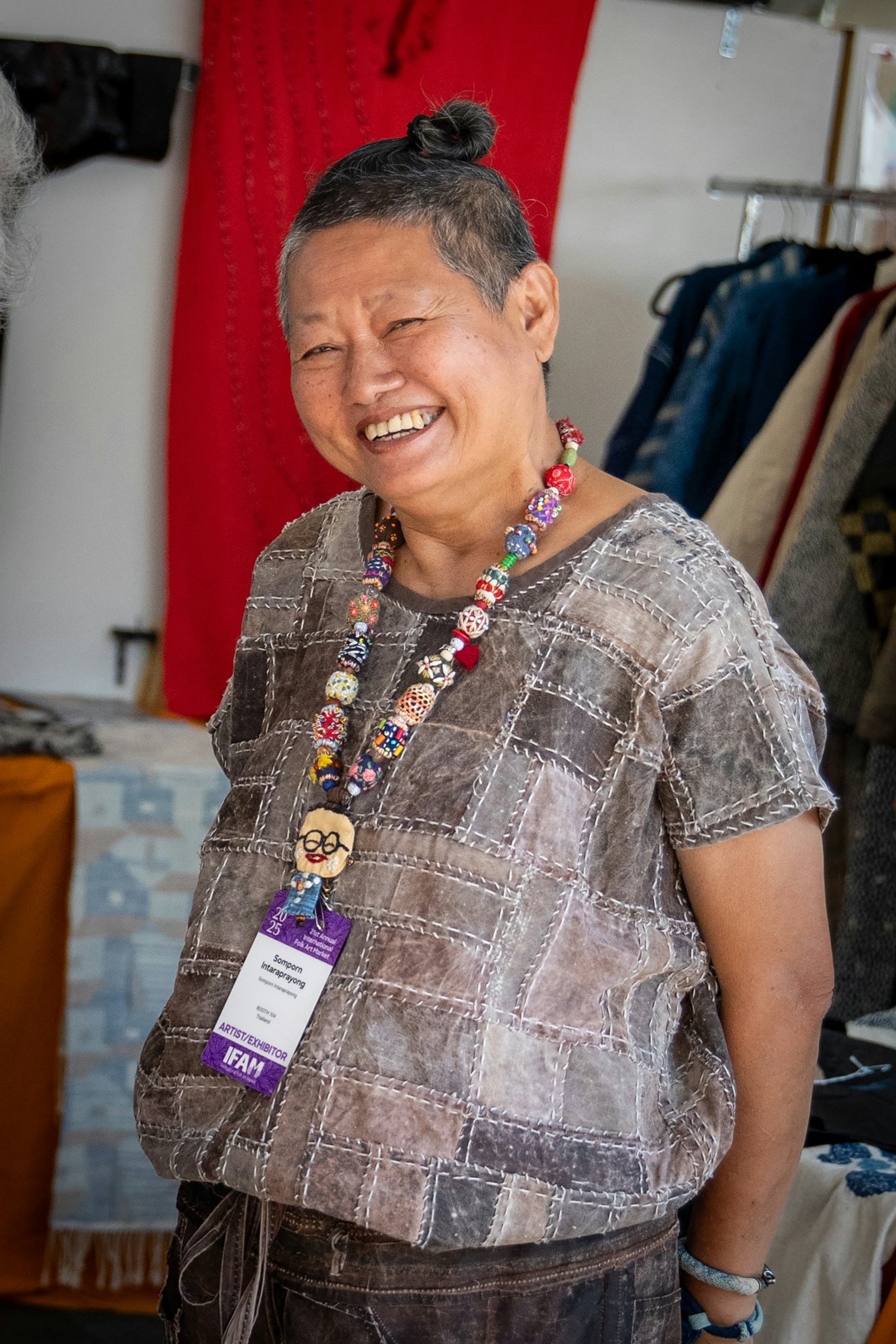 Somporn Itaraprayong in her booth at the International Folk Art Market. Photo by Kathi Littwin, courtesy of the Internatinal Folk Art Market
