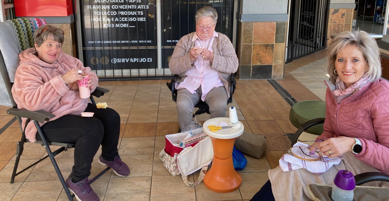 Members of the Fine Art Embroidery Guild in Pretoria, South Africa, gather for World Embroidery Day.