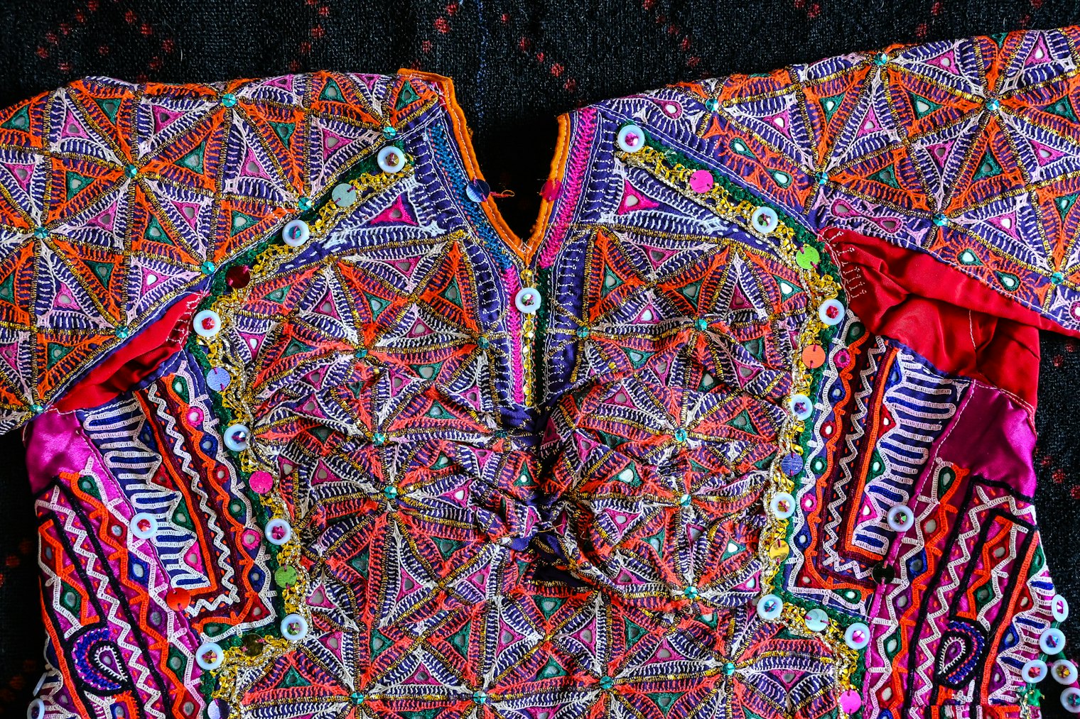 Kanchali detail highlights the machine-stitched gold lines.