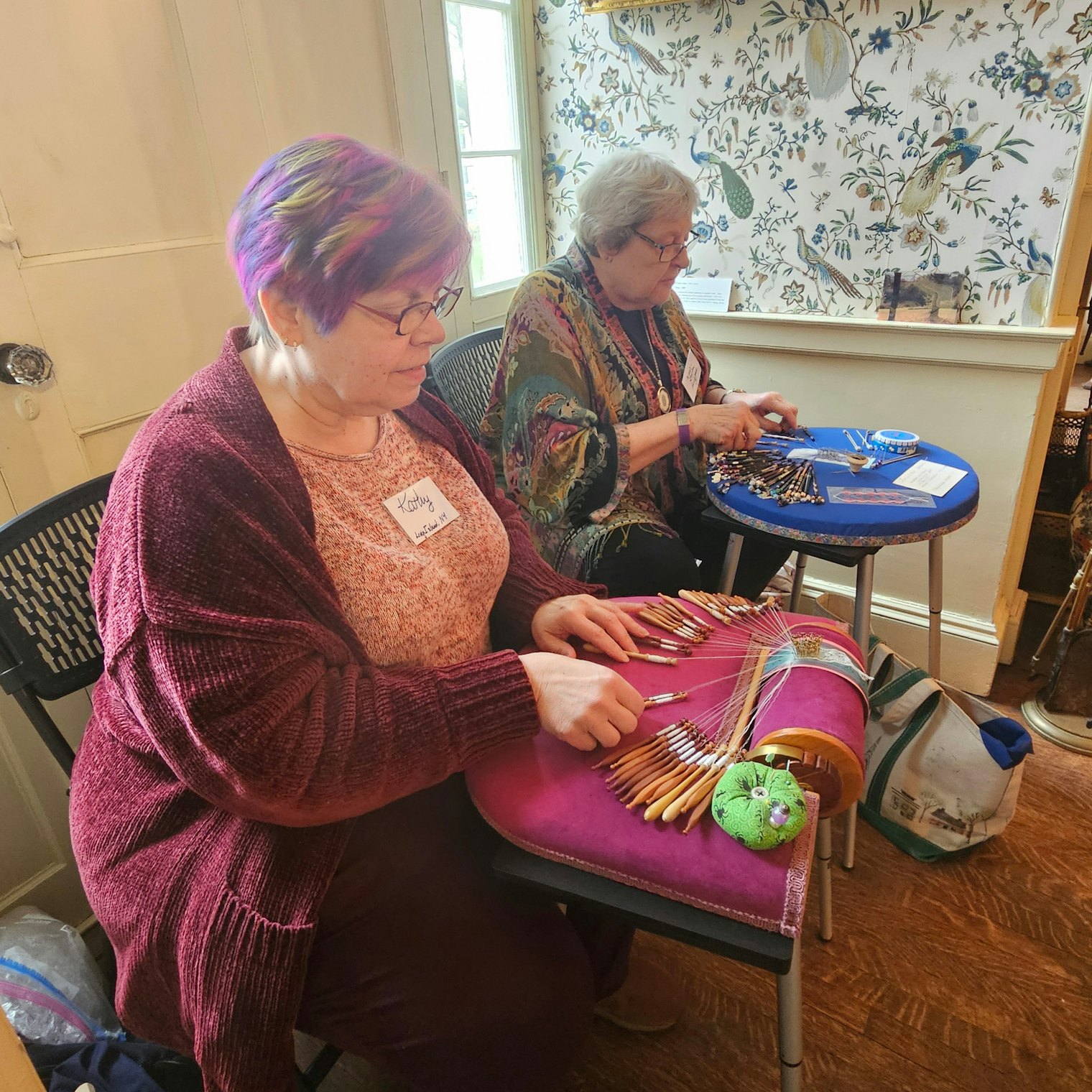 Lacemakers throughout the Heard House in Ipswich demonstrated historic and contemporary laces to show visitors that lace continues to be an active art and craft in practice today. Kathy Draves and Mary Linden found a well-lit location for their examples.