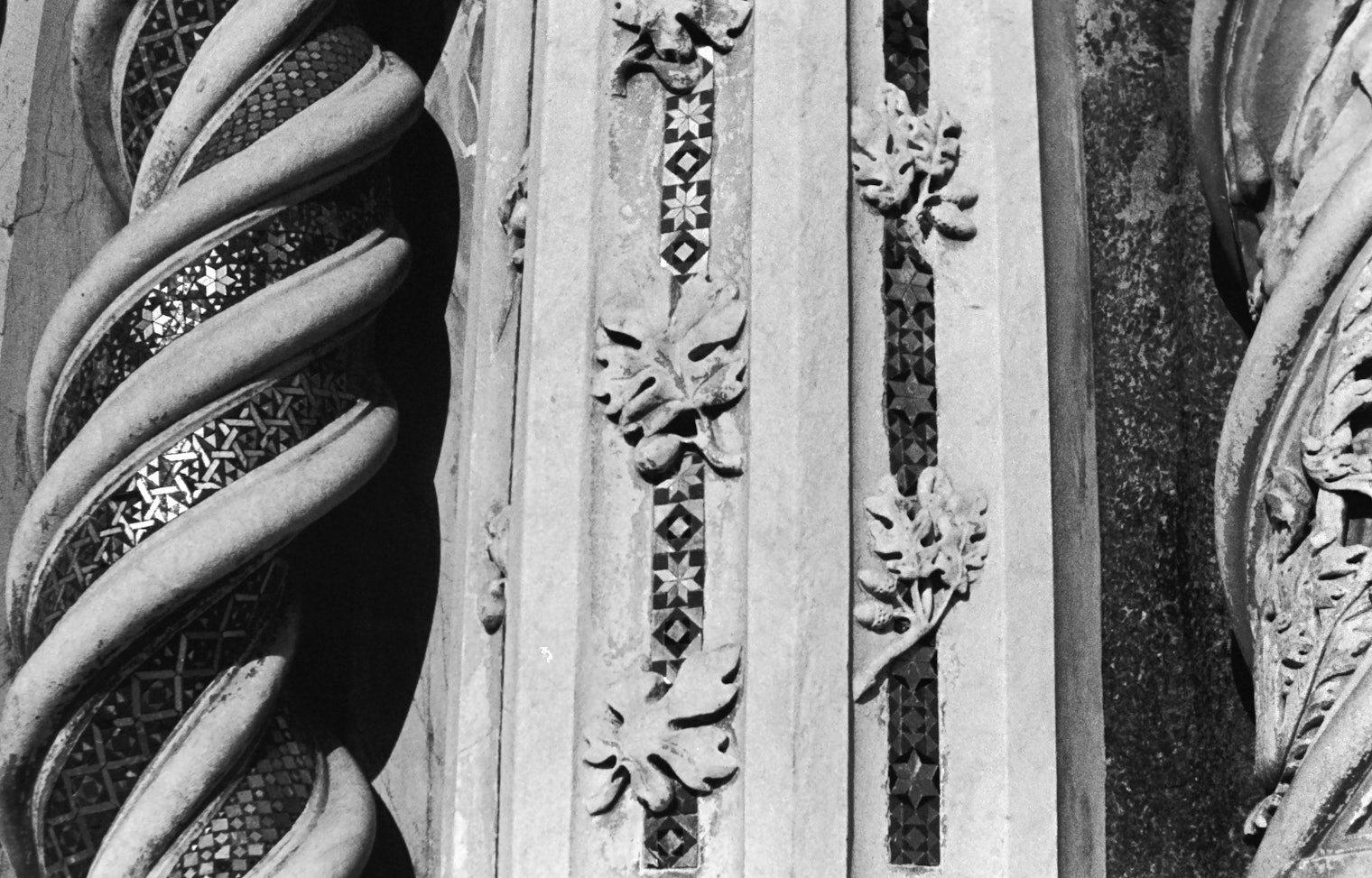Detail of the Orvieto duomo facade highlighting acorns and pomegranates.