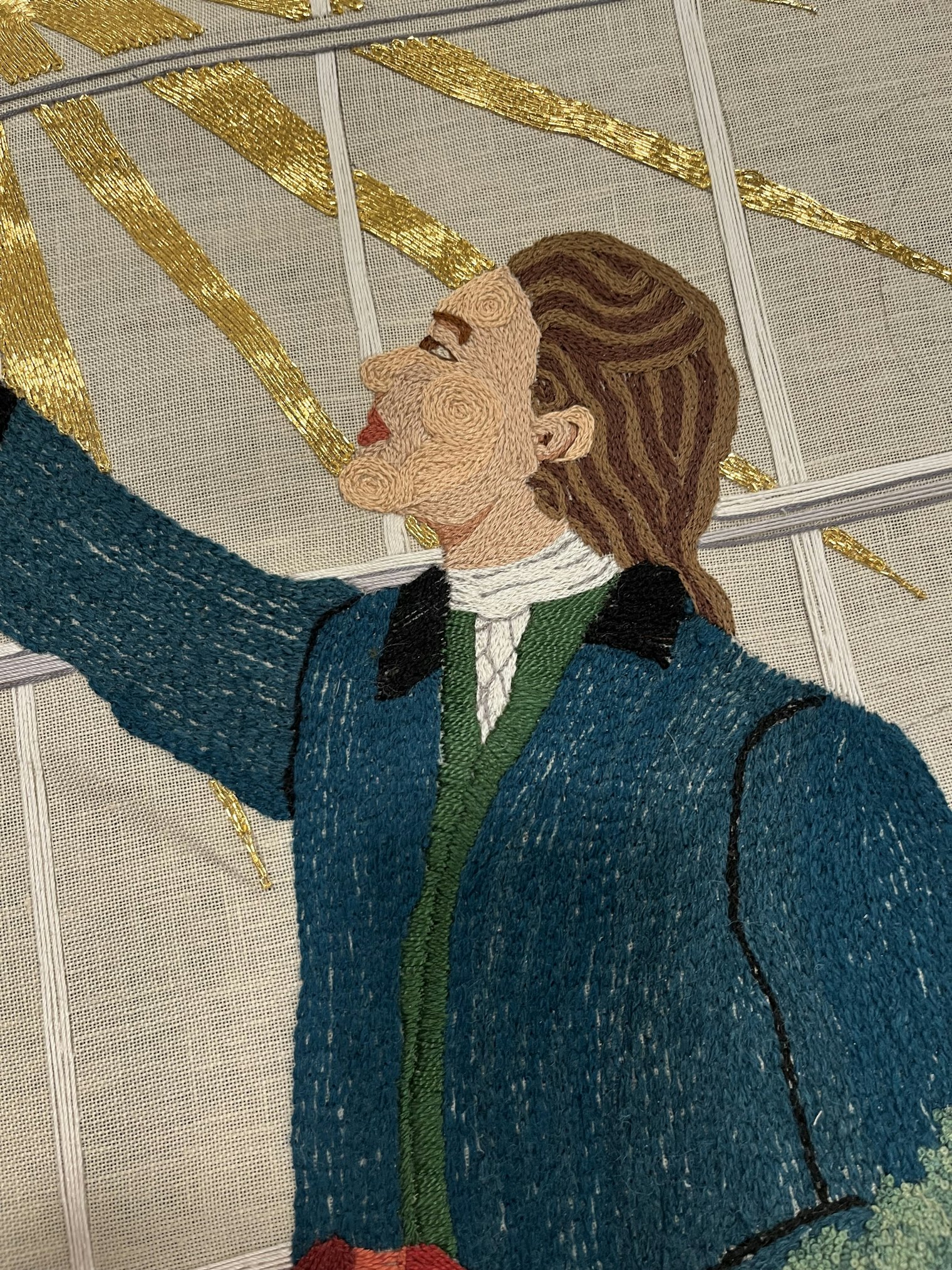 Detail of a motif from the Massachusetts panel featuring shopkeeper and chocolate maker Caleb Davis. The state director is Denise De More and stitching is primarily conducted by members of the Mayflower Sampler Guild with help from volunteers across the state.