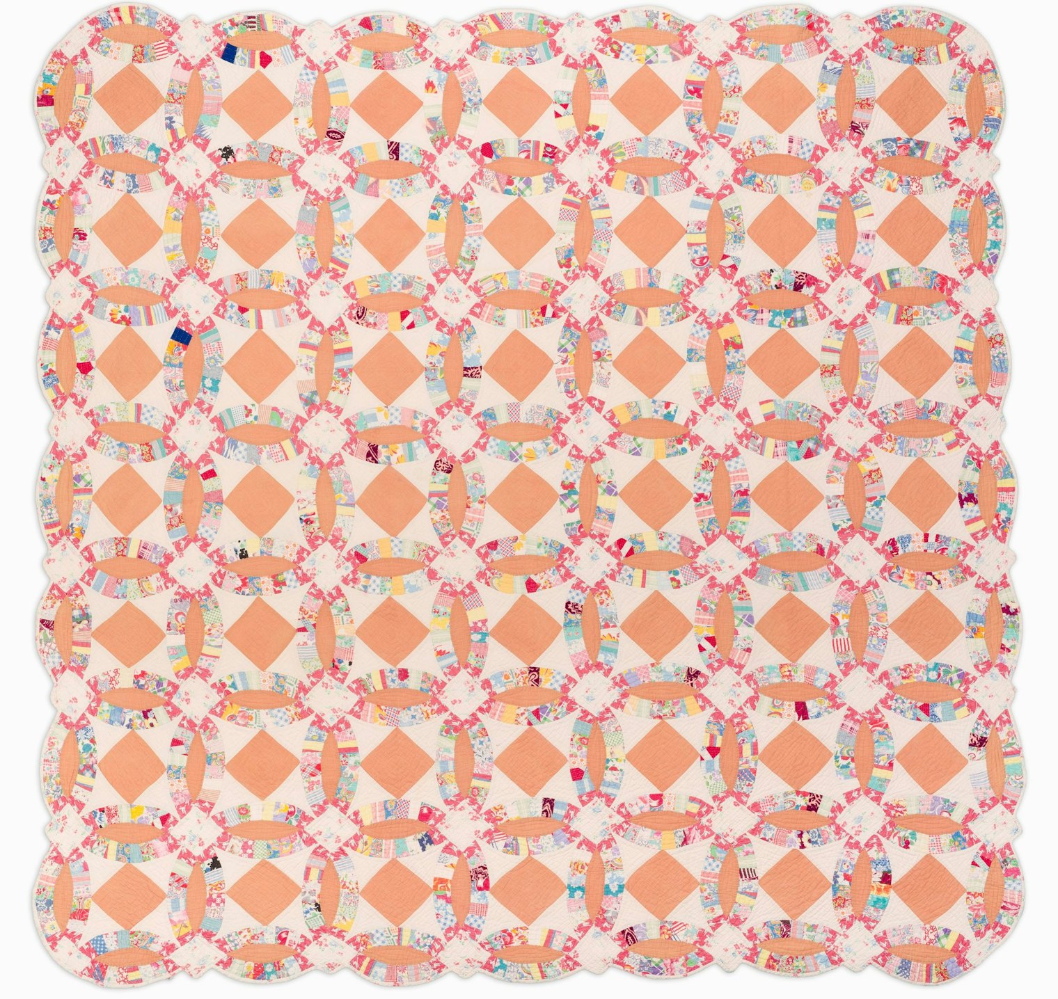 Unidentified Maker, Feed Sack Quilt, Double Wedding Ring, U.S.A., circa 1930–40. Cotton on Thin and even batting, possible sack backing. 82 in. x 84 in. Gift of Pat L. Nickols; digitization made possible through the Quilter's Guild of Dallas, Quilt Accessibility Project, 2012-35-123. Photo courtesy of Tim Siegert