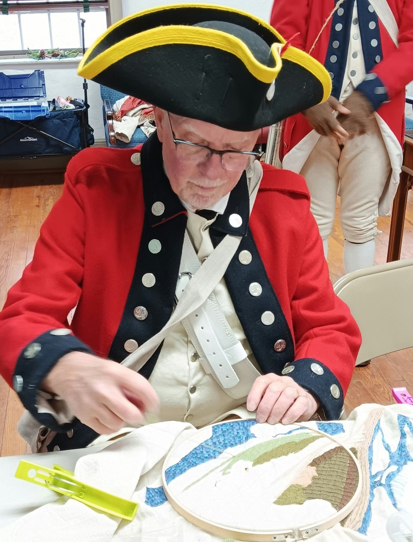 "Christmas in Odessa" is an annual event sponsored by the Women's Club of Odessa, Delaware, on the first Saturday of December. Here, a Colonel from Massachusetts came to help Odessa begin their Holiday celebrations, joining with members of the Pennsylvania Historic Regiment. He stitched using long and short stitch, split stitch and Bayeaux stitch, using Paternayan wool and Appleton wool.