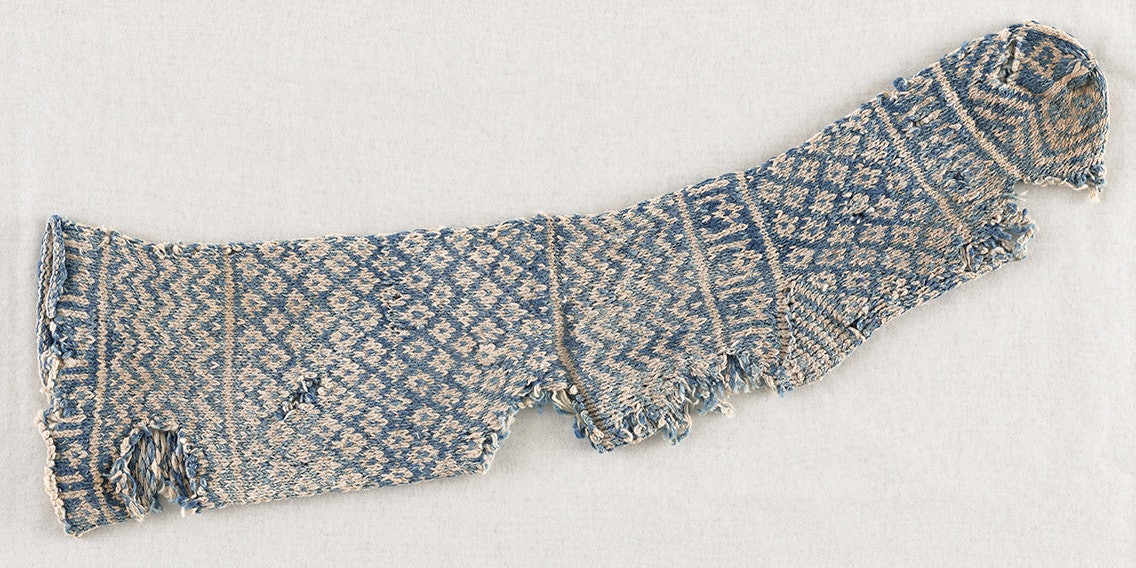 The twelve-century sock from North Africa served as Elaine's inspiration for her design. Photo courtesy of George Washington Textile Museum