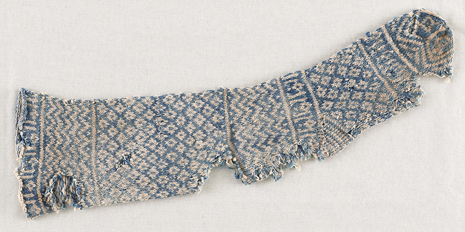 The twelve-century sock from North Africa served as Elaine's inspiration for her design. Photo courtesy of George Washington Textile Museum 