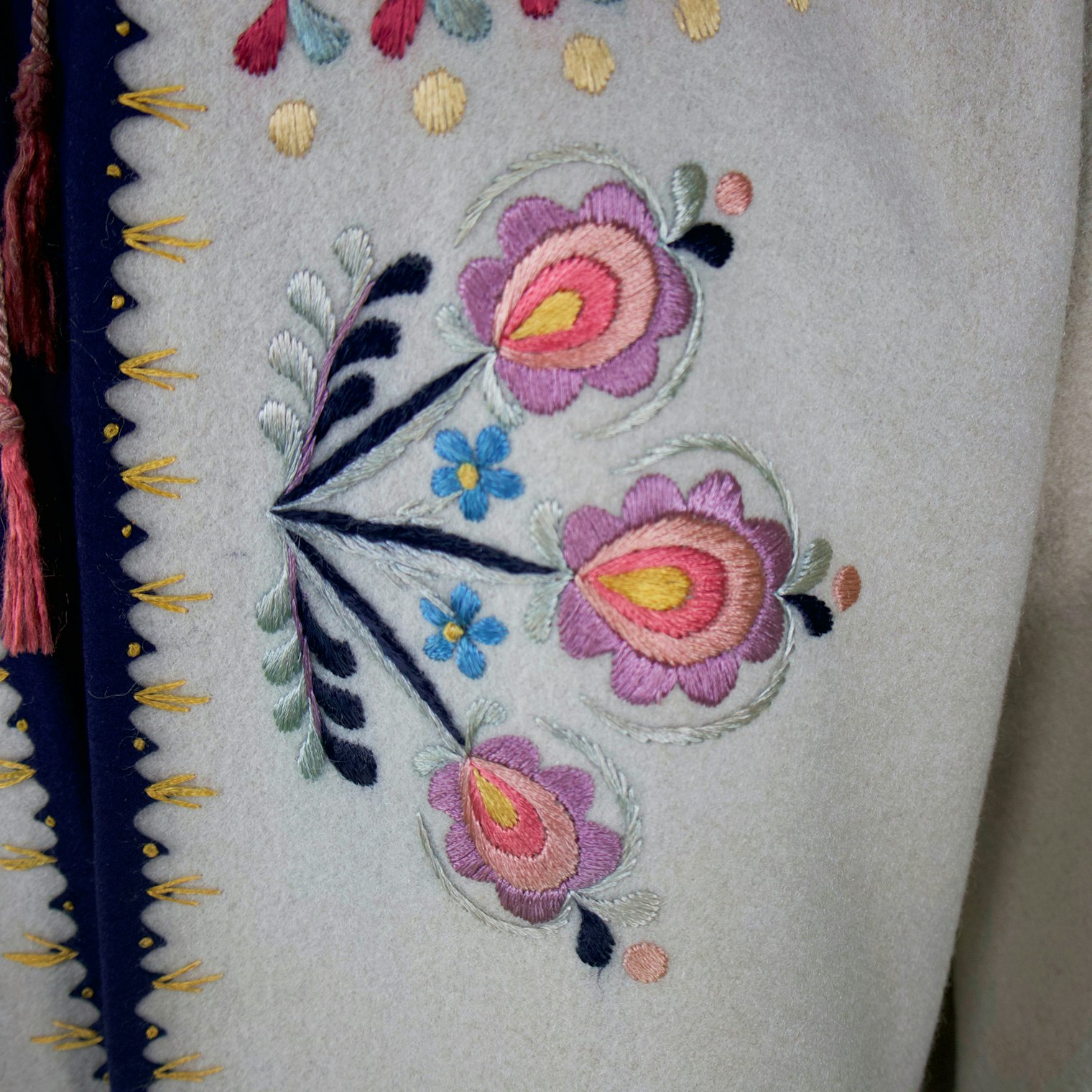 Floral detail on the front of Phoebe's Polish jacket.