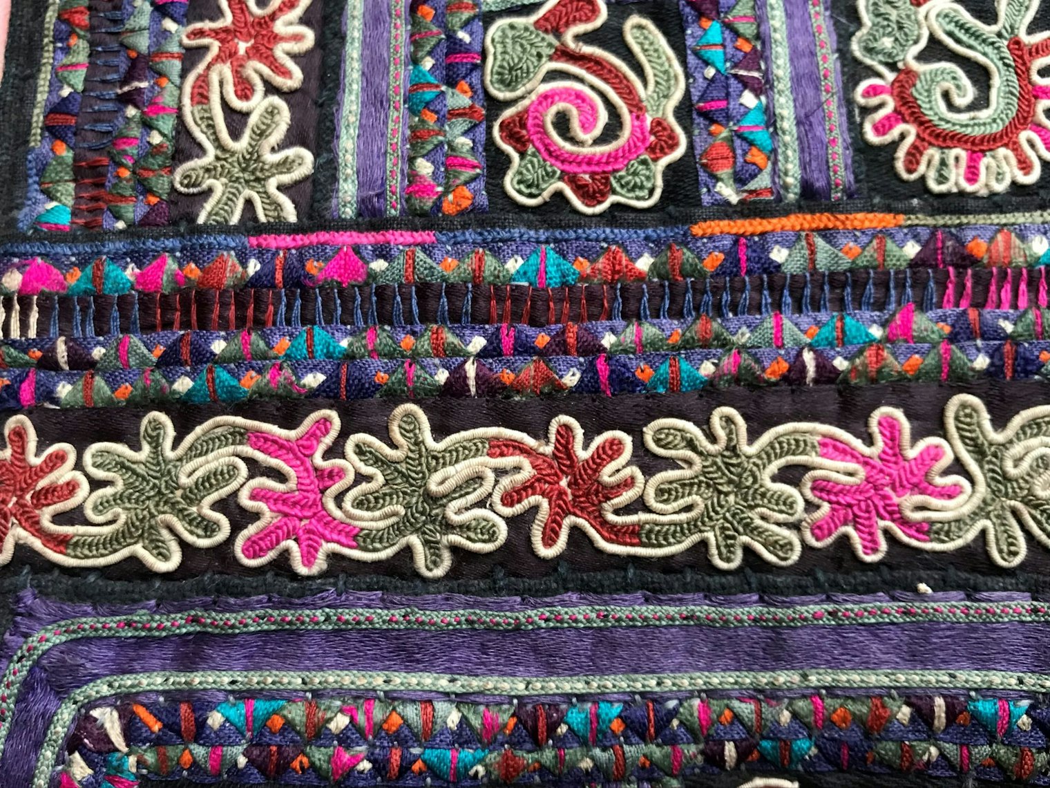 A detail of Wen Kui Xiang couched braid embroidery.