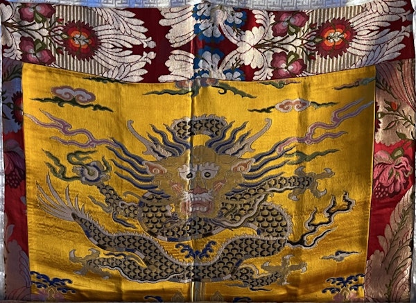 An embrodered banner inside a Buddhist temple in Pokhara, Nepal.