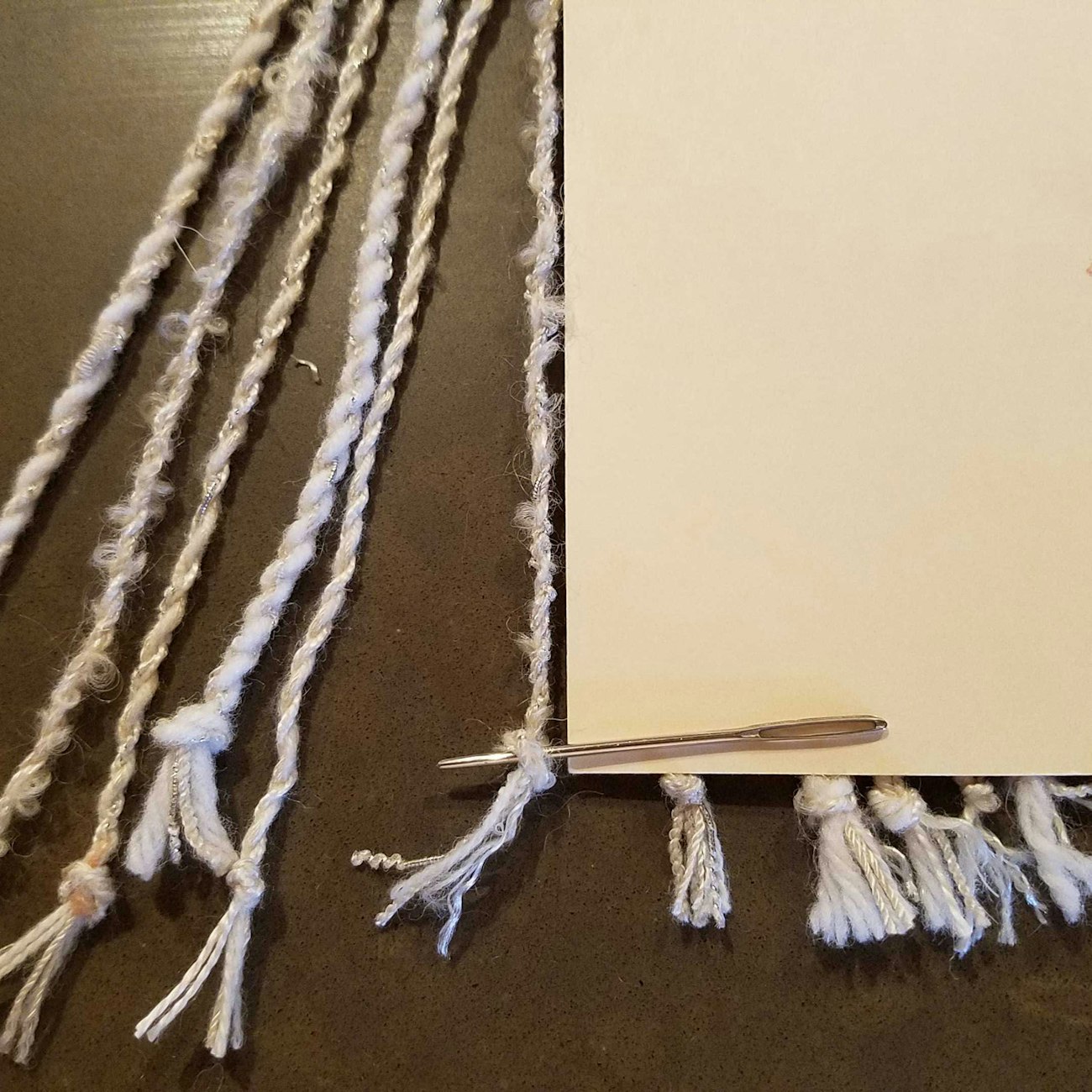 fringe with needle