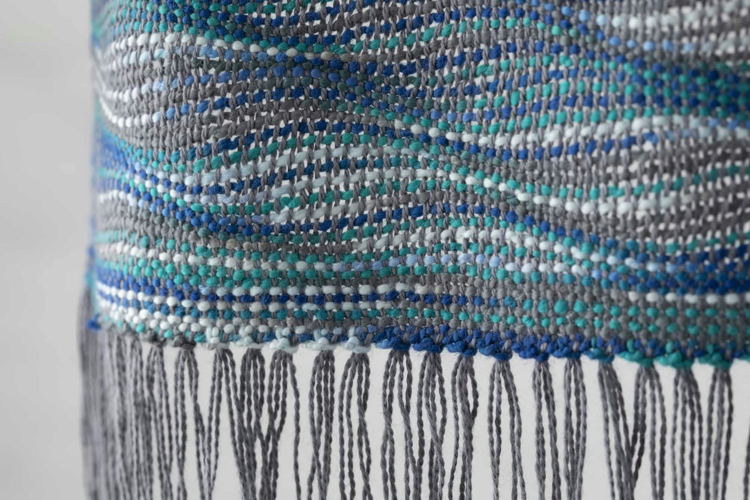 Rebecca Cengiz-Robbs’s Ocean Waves scarf from the Easy Weaving with Little Looms Holiday 2021 issue. Photo by Matt Graves