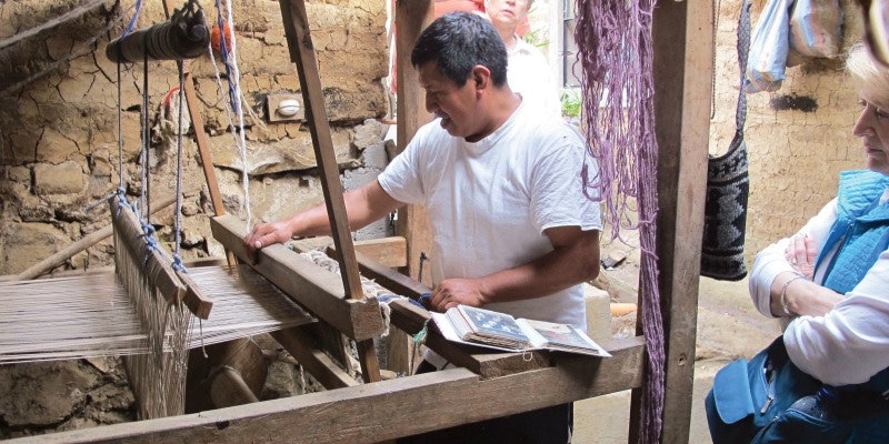 Mr. Alvarado at his loom. Photo by Anita Osterhaug.