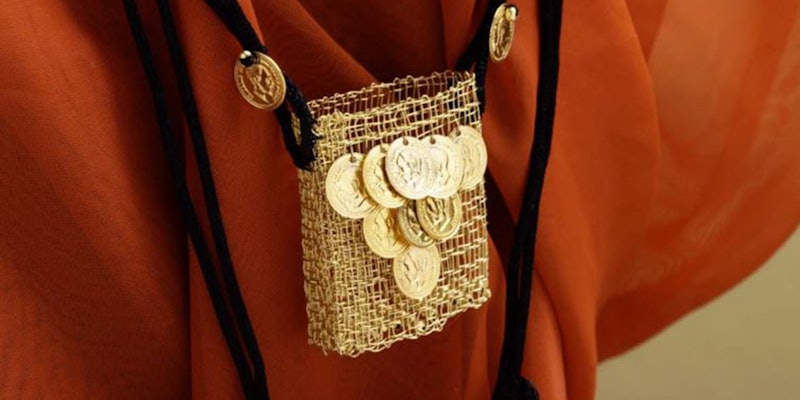 Ferguson gold purse Coca