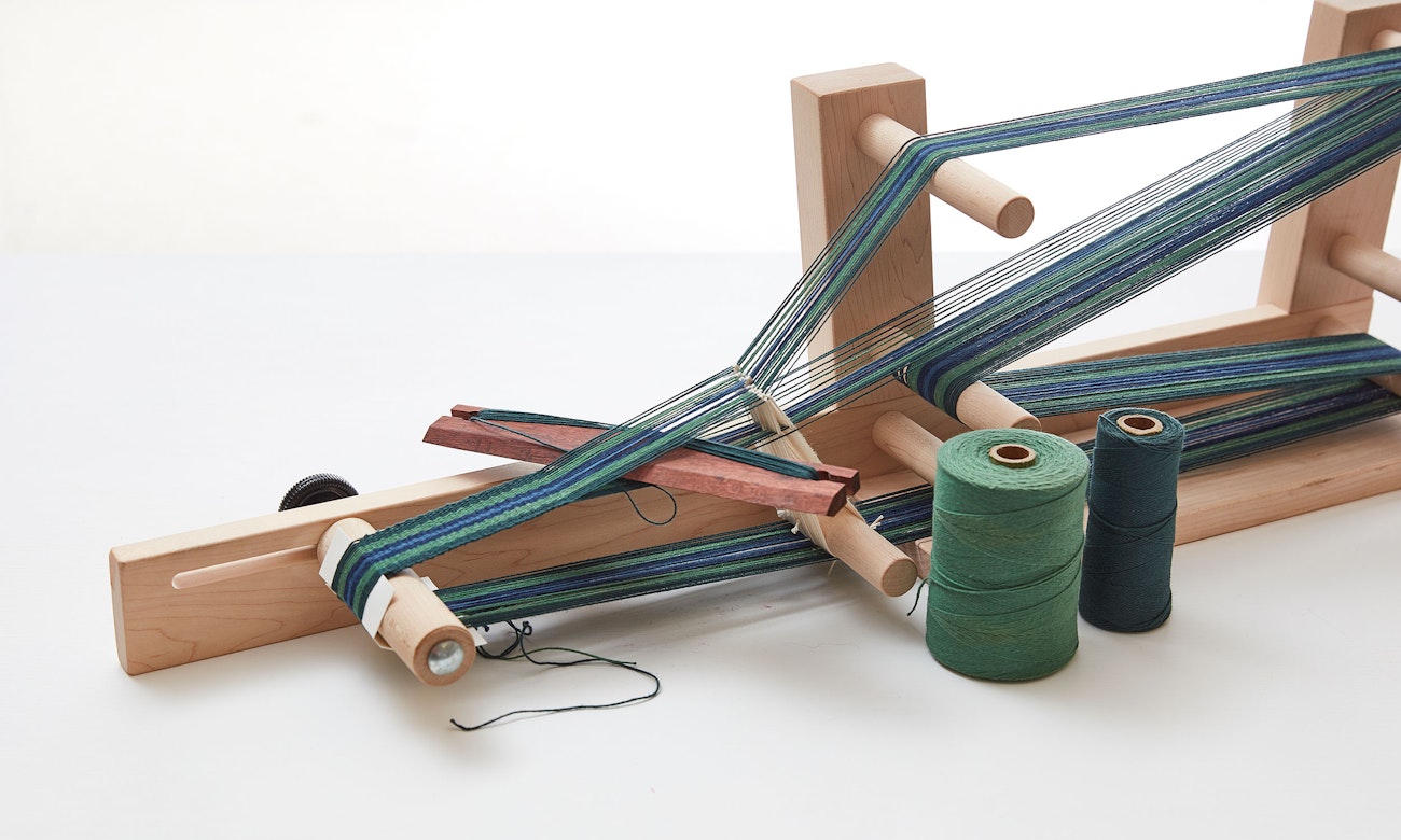 Example of an inkle loom—one out of many different types of weaving looms out there! Photo by George Boe. 