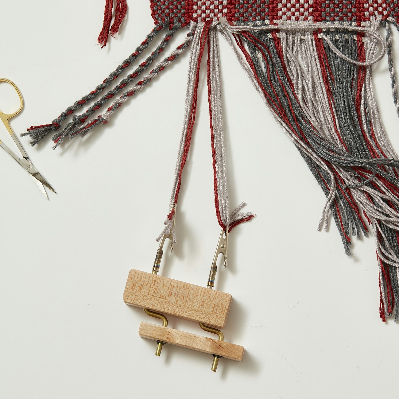 Clip half of each bundle in a fringe twister. Photo credit: George Boe