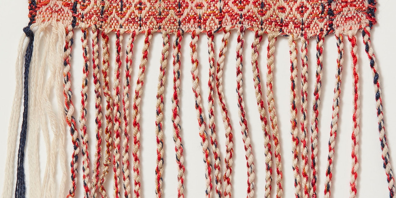 Learn a few tricks for fringe, including adding weft to create more consistency in color as shown in this example. Photo credit: George Boe
