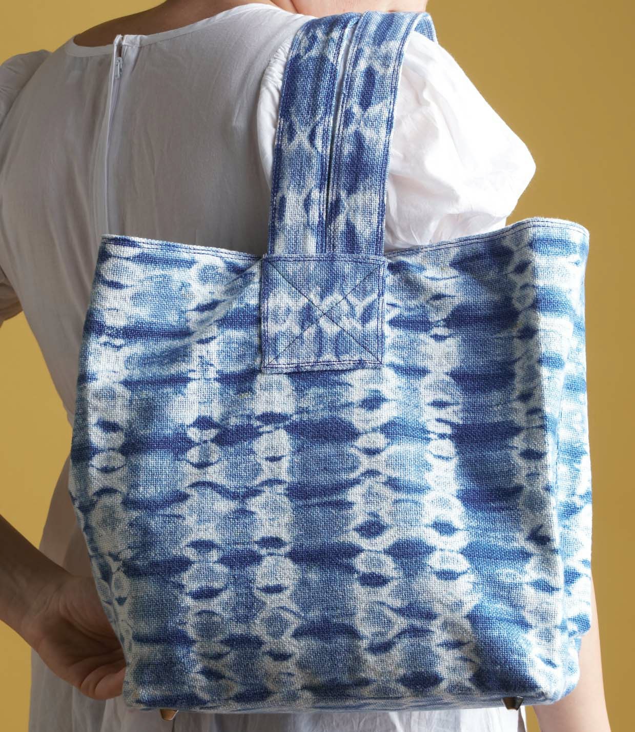 Grab your indigo dye and 4-shaft loom and weave this beautiful, and useful, bag from Patricia Springer. Photo by Joe Coca.
