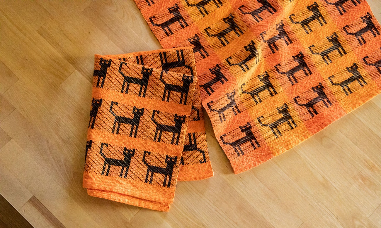 Black Cat Towels by Sherrie Amada Miller. Photo by Matt Graves