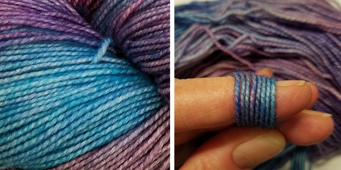Left detail of a yarn skein that is blue and purple, at right wrapping yarn around a finger