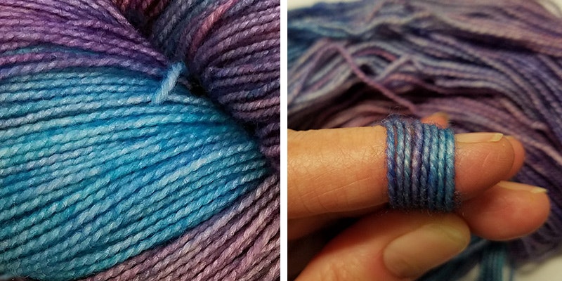 Left detail of a yarn skein that is blue and purple, at right wrapping yarn around a finger