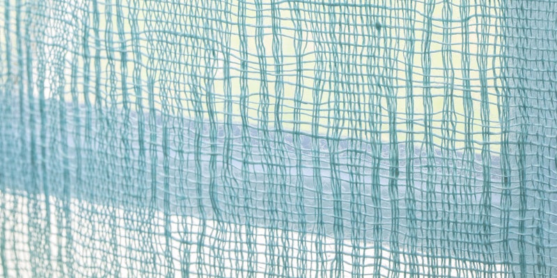 Loosely sett linen in huck lace makes for a gauzy curtain. Photos by Matt Graves
