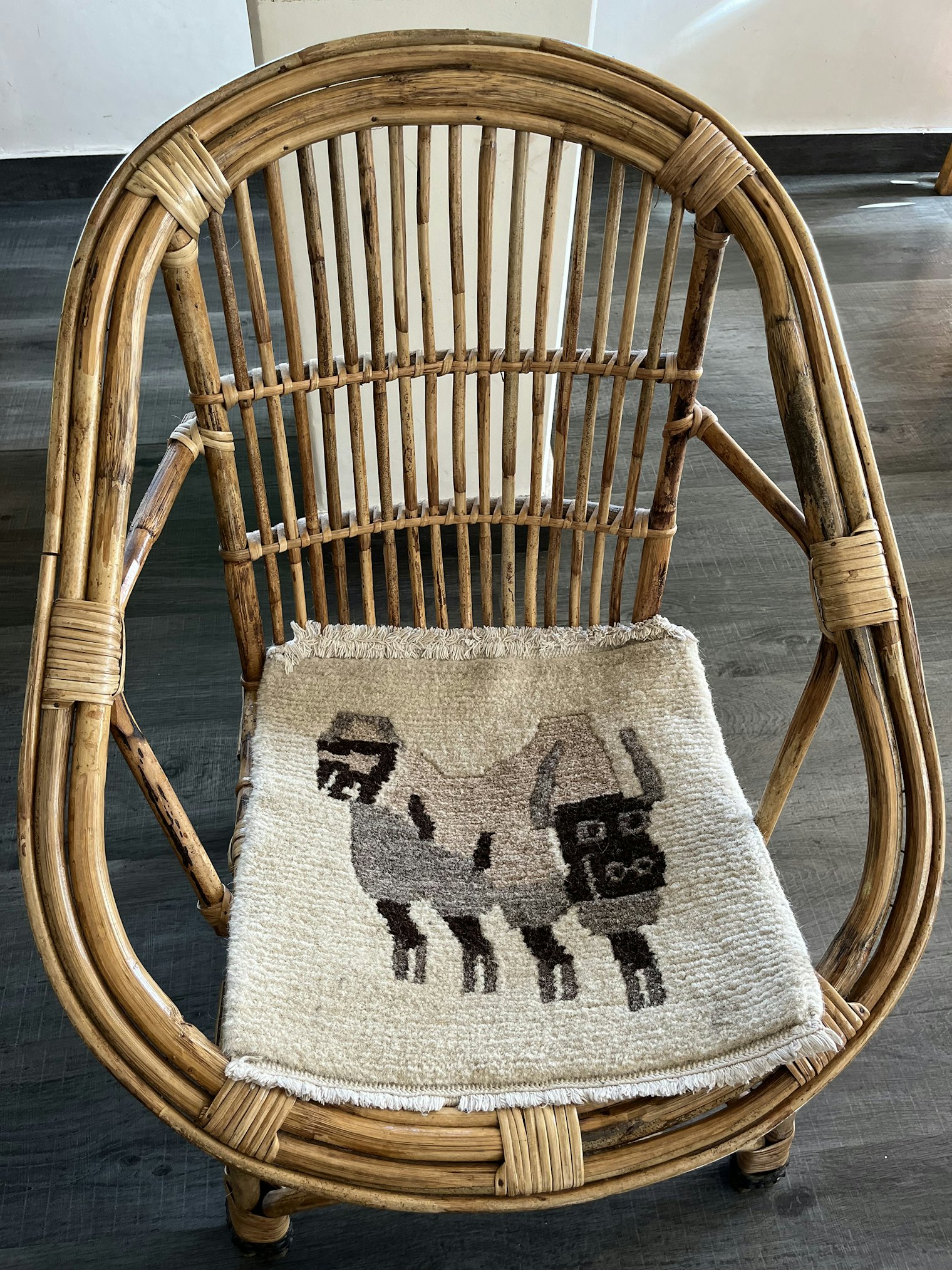 The Rock and Mud hotel commissioned these chair pads from their neighbor, galaicha weaver Ran Maya Gurung. Yak motifs are common, as are mandalas, roses, red pandas, and Annapurna.