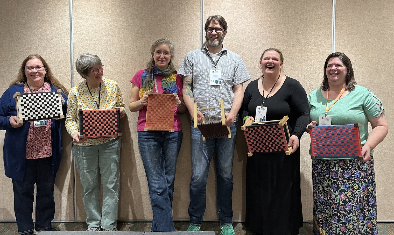Students show off their finished work in Sara C. Bixler’s “Shaker Stool Weaving” class. Sara is standing second from right.