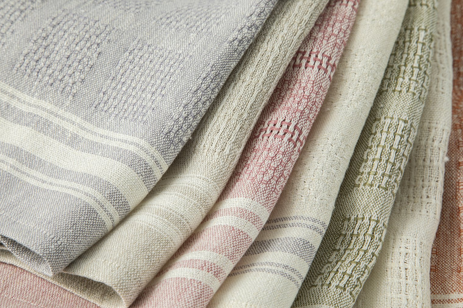 The project includes details for weaving seven towel variations.