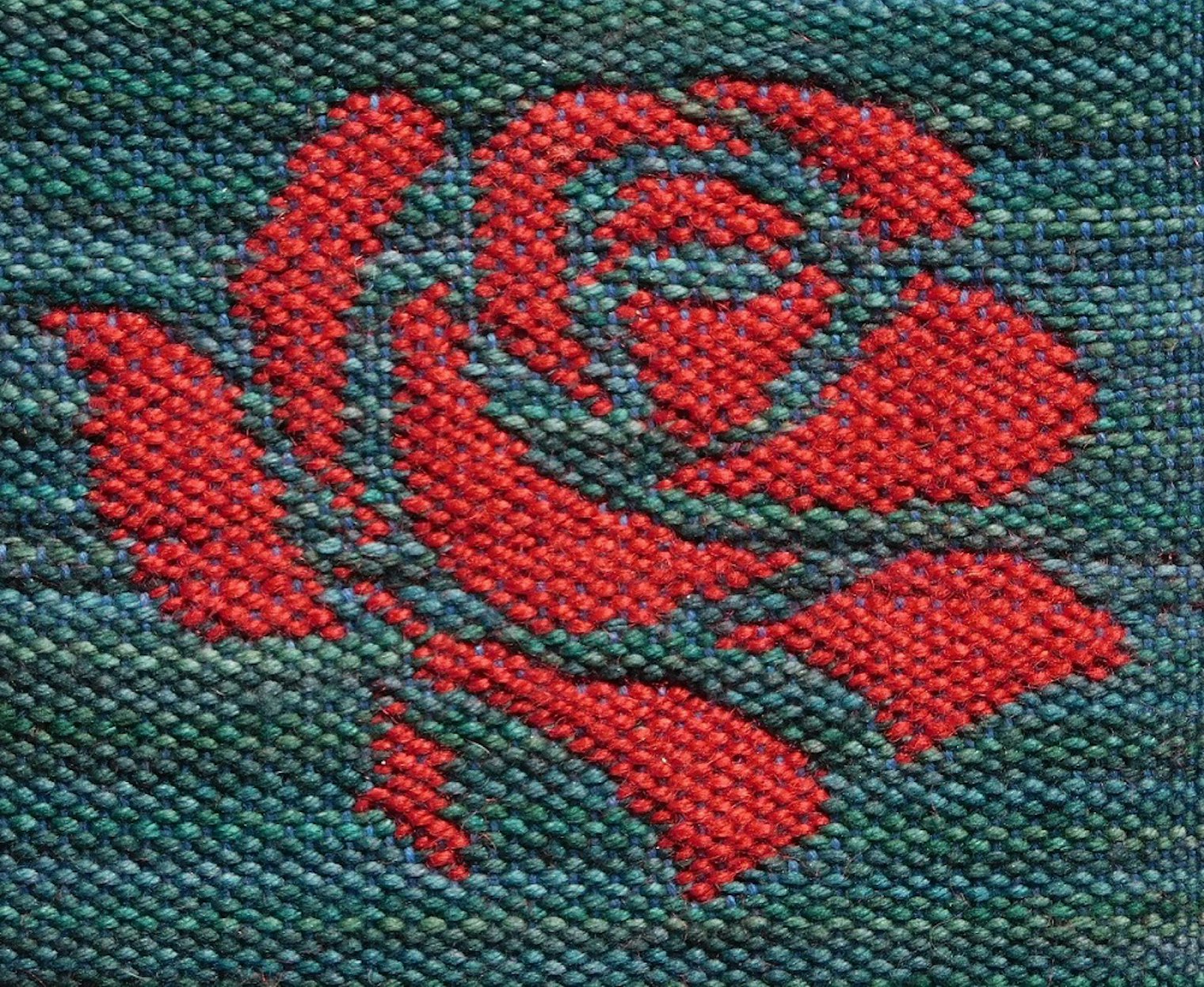 The front face of a rose woven in doubleweave.