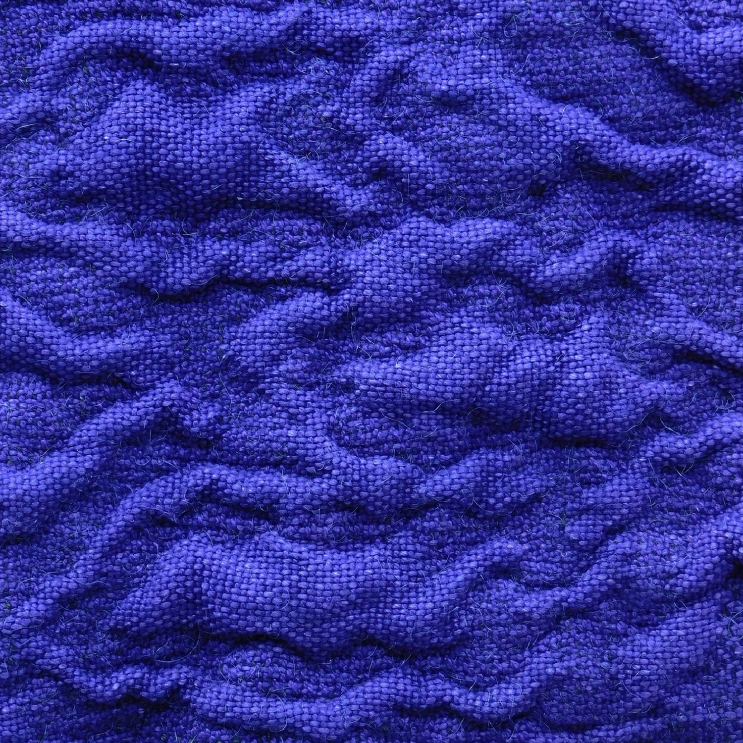 A detail showing a section of piqué—quilted doublecloth.