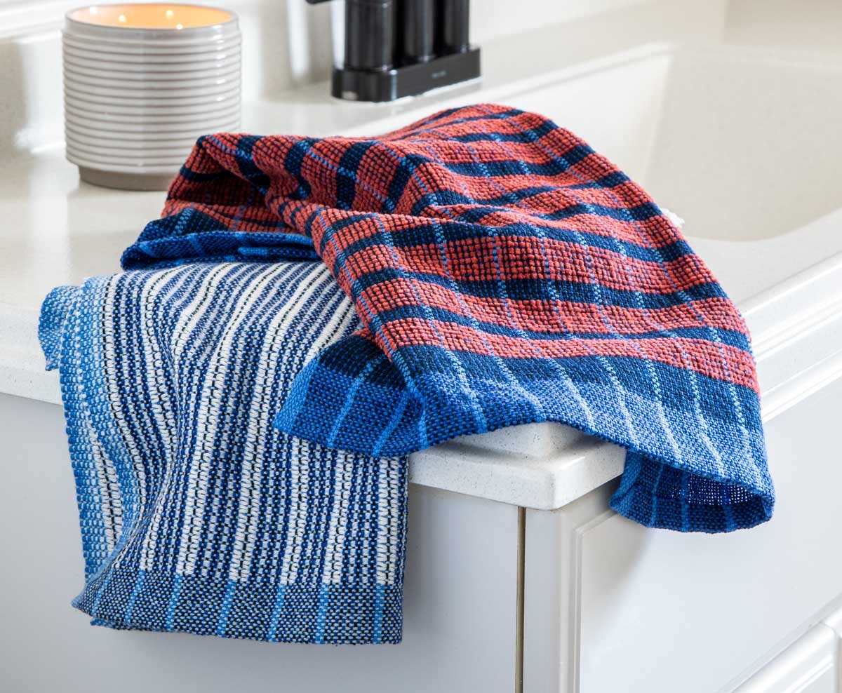 Hand towels with vertical and horizontal stripes.