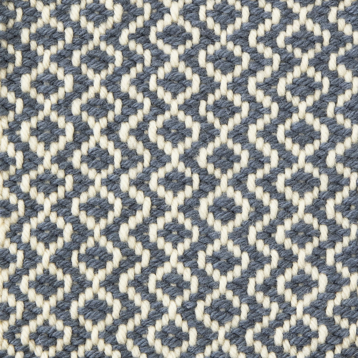 Sample 6: 4-shaft point twill. This sample includes 3-end floats in and around the diamond shapes, which led to more shrinkage. Advancing twills with short floats are an area for further sampling.
