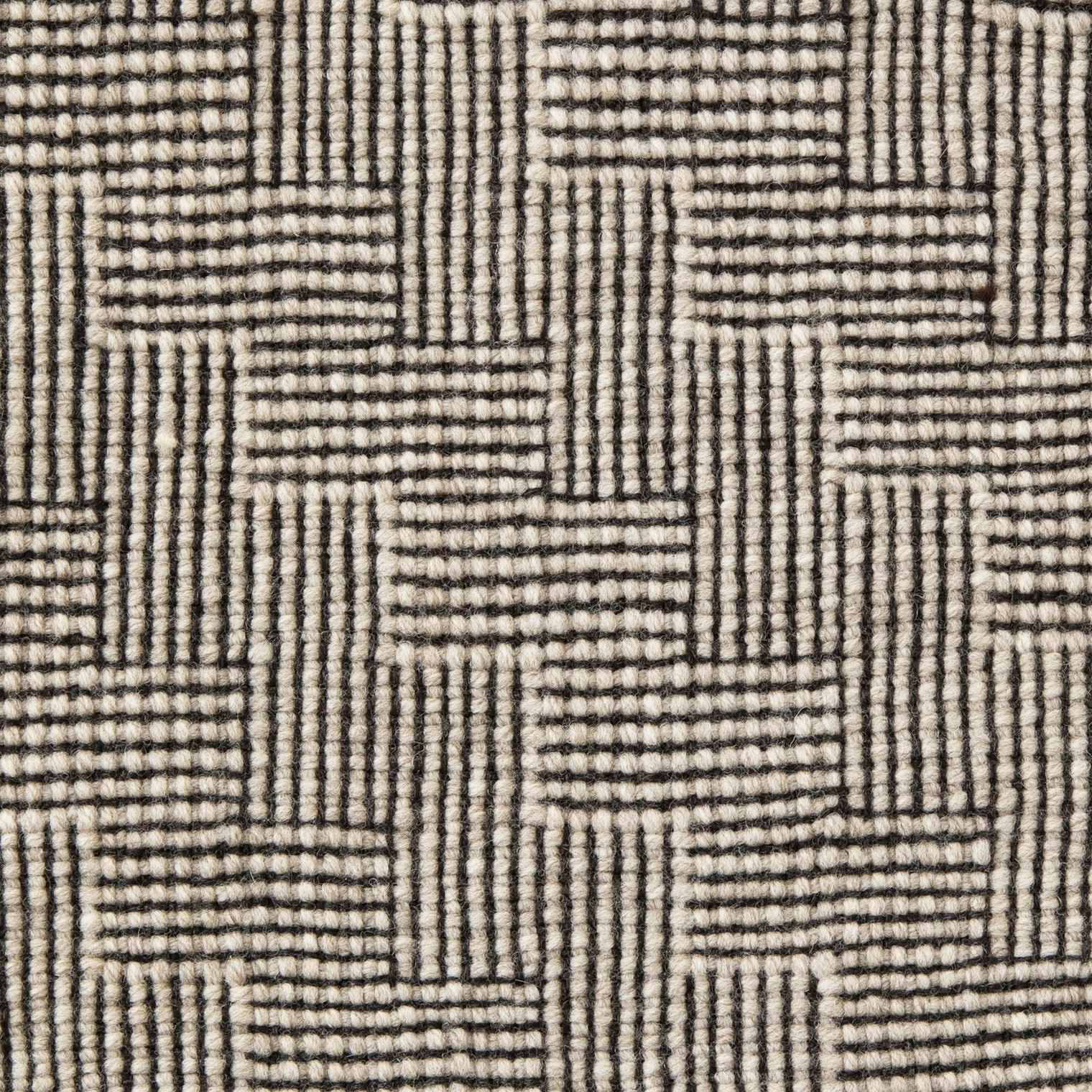 Sample 3: 4-shaft shadow weave. This sample combines Harborside Aran light ends with Nature Spun fingering-weight dark ends. The shadow weave patterning holds up even after wet-finishing.