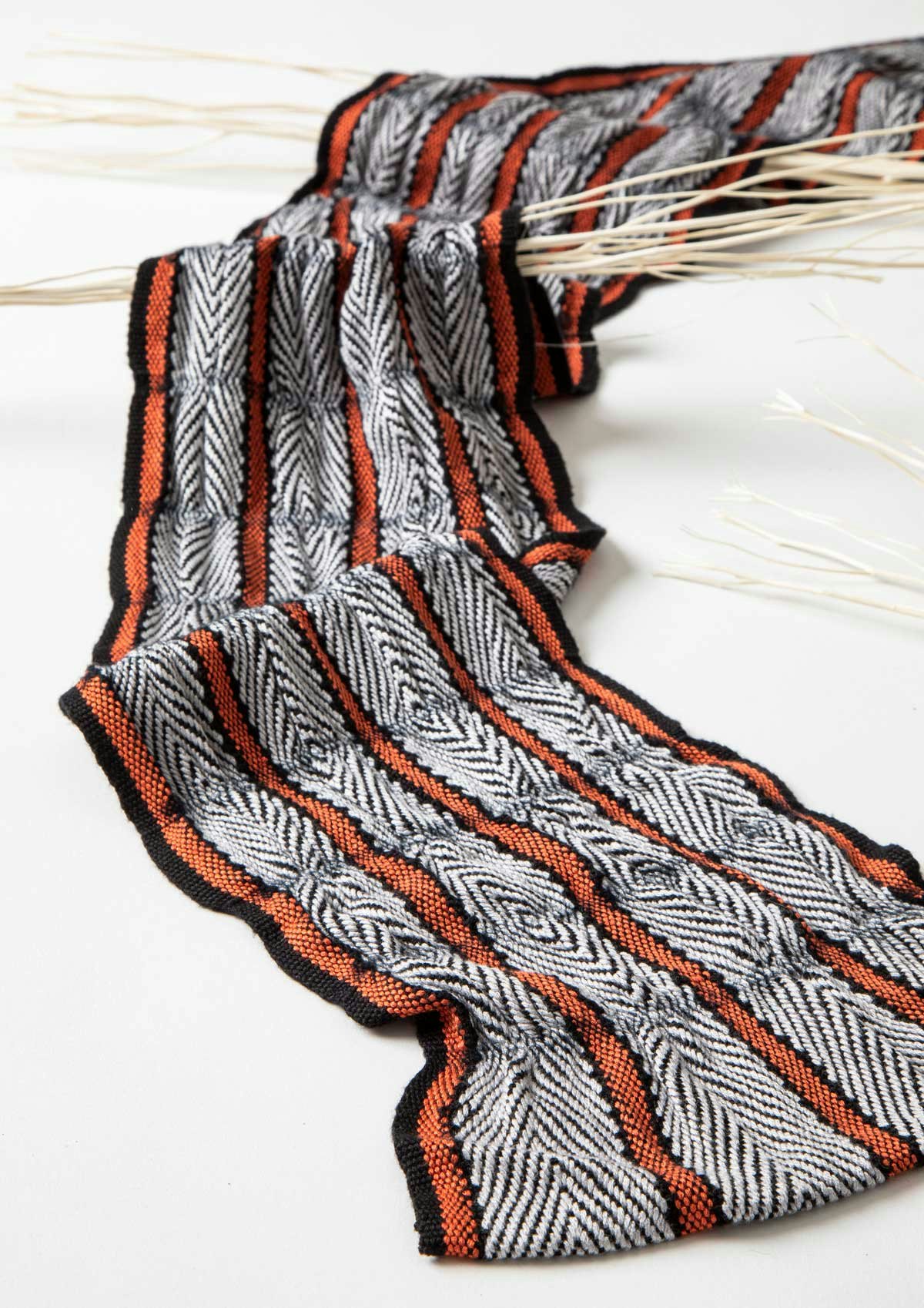 Differential shrinkage leads to ruching in Alison Stewart-Guinee’s Birds of a Feather Scarf.