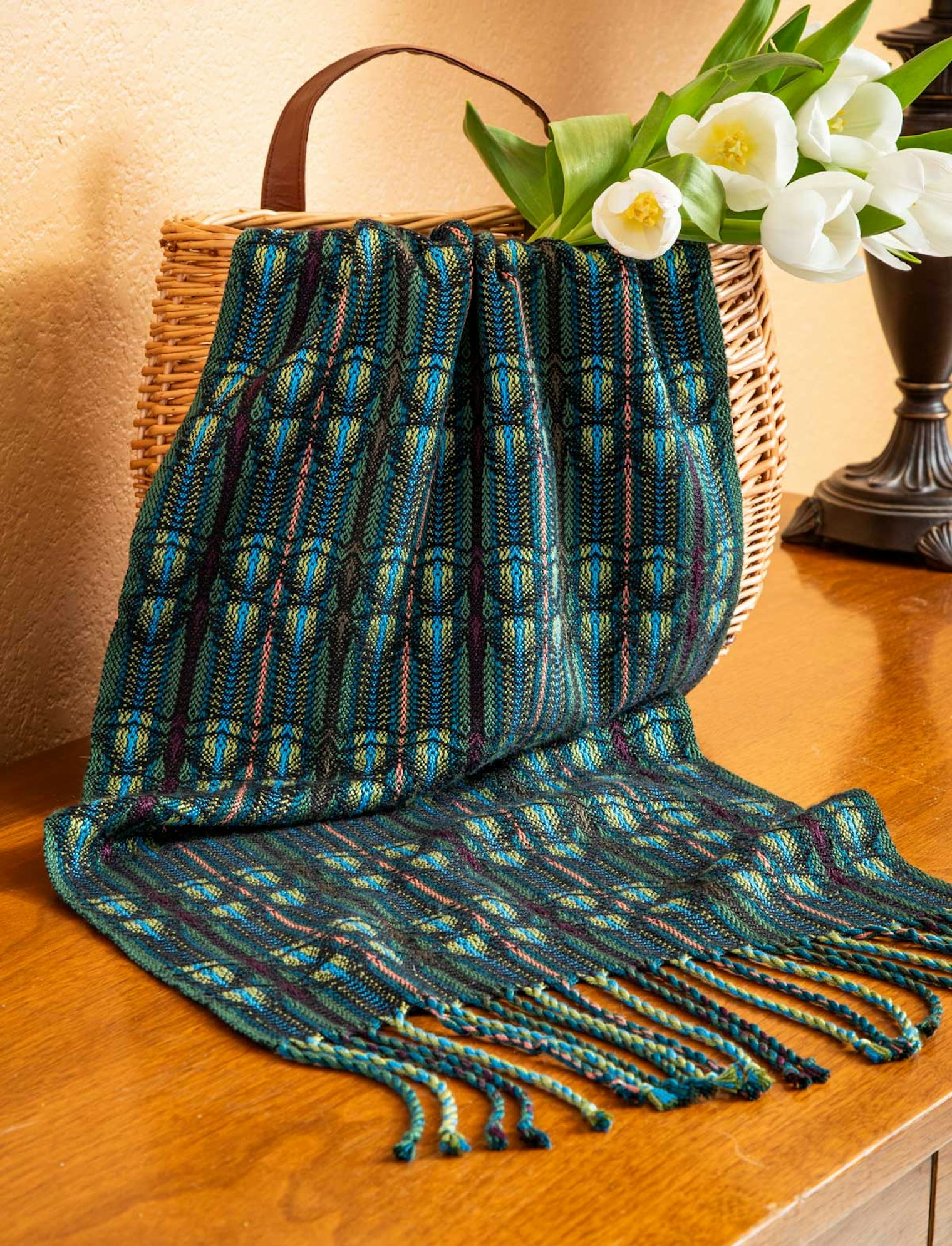 Shelby Moravec’s Flight of Dragonflies scarf uses silk to capture the colors and iridescence of those beautiful creatures.