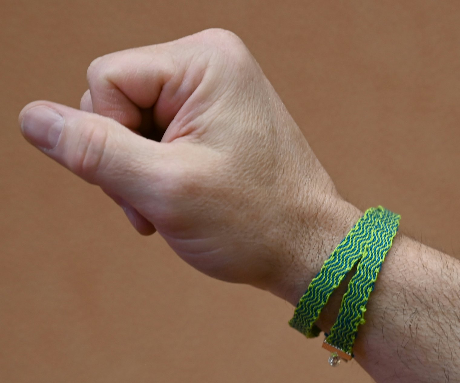 A tablet-woven bracelet created at Weave Together 2026.