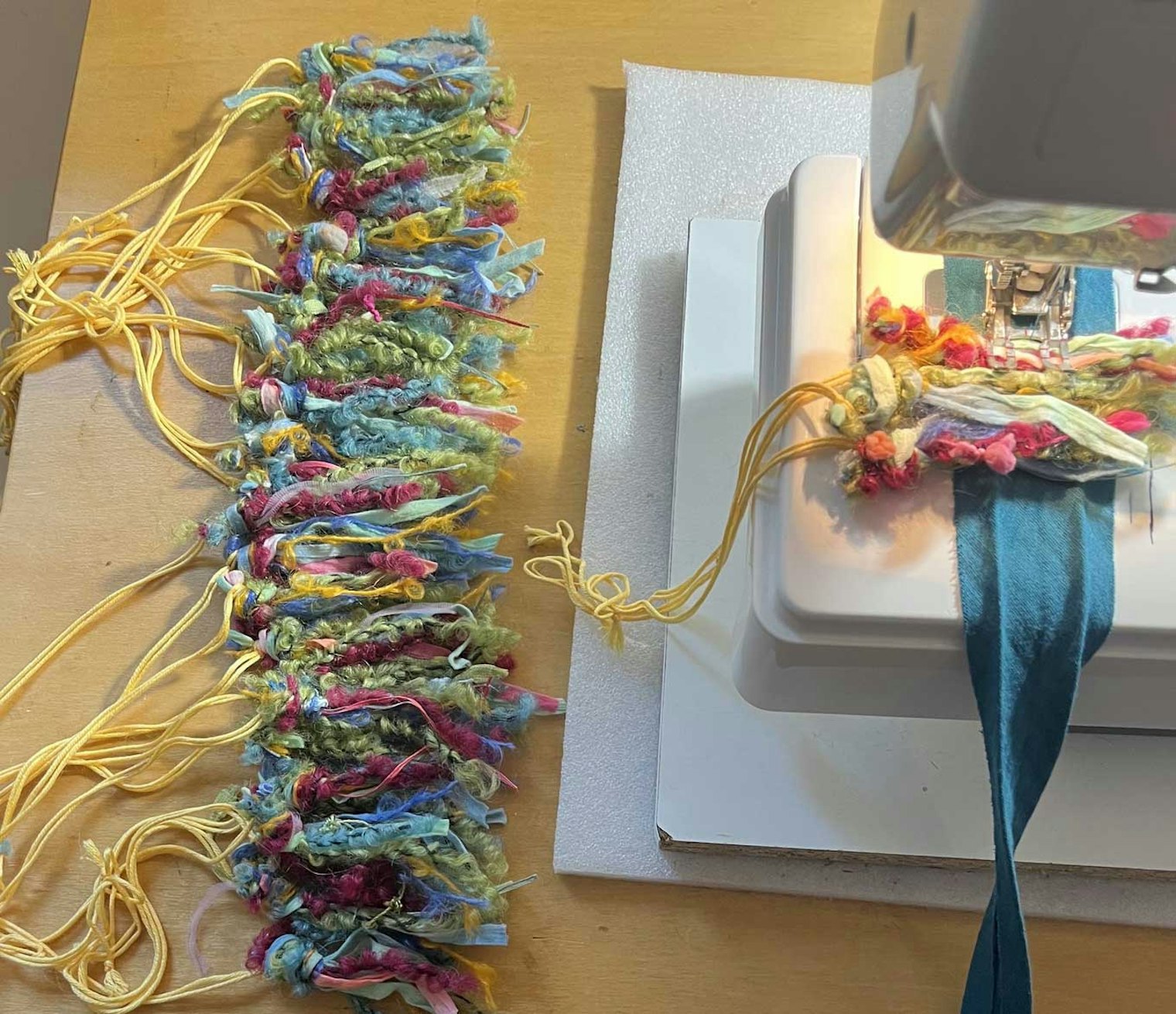 Barbara lined up the scraps next to her sewing machine, and then worked with three bundles at a time.